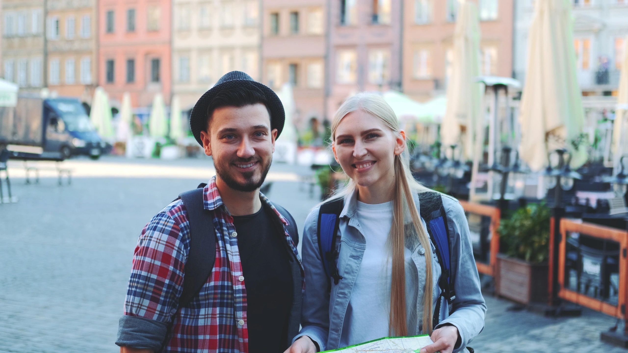 Travelers reviewing a map while planning their trip